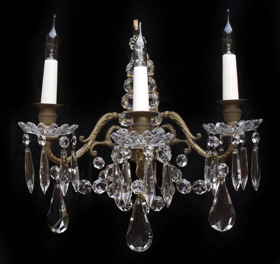 Pair of 3 light French antique wall lights with crystal drops